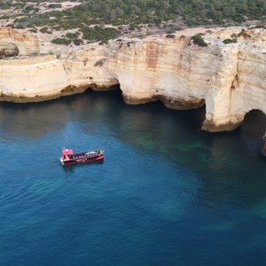 a small boat in a body of water