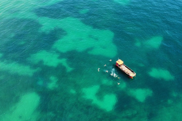 a blue and green water