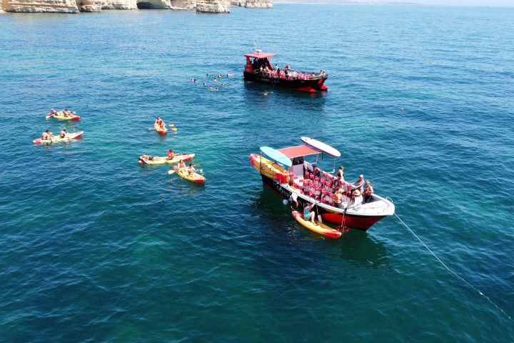 a small boat in a large body of water
